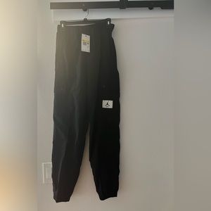 🔥🔥Nike Air Jordan nylon wind pants. Size ladies small NWT retail price $90